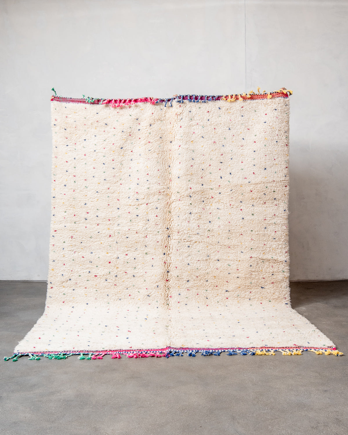 Modern, designer, handcrafted Berber rug from Morocco. Beniourain carpet with beautiful colours and patterns and fluffy wool texture.